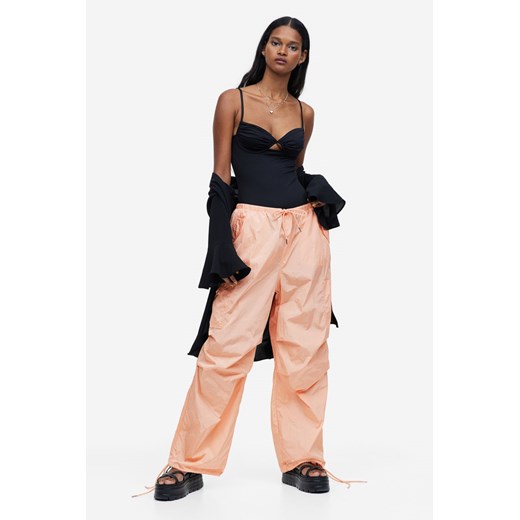 H & M - Nylonowe spodnie spadochronowe - Pomarańczowy H & M M H&M
