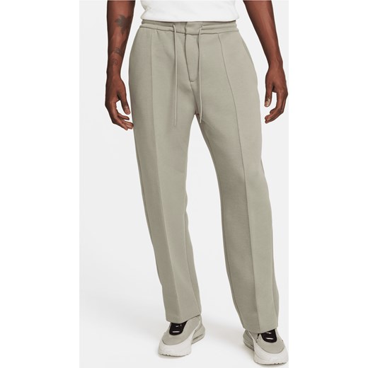 Męskie spodnie dresowe o luźnym kroju u dołu Nike Sportswear Tech Fleece Reimagined - Szary ze sklepu Nike poland w kategorii Spodnie męskie - zdjęcie 171364861