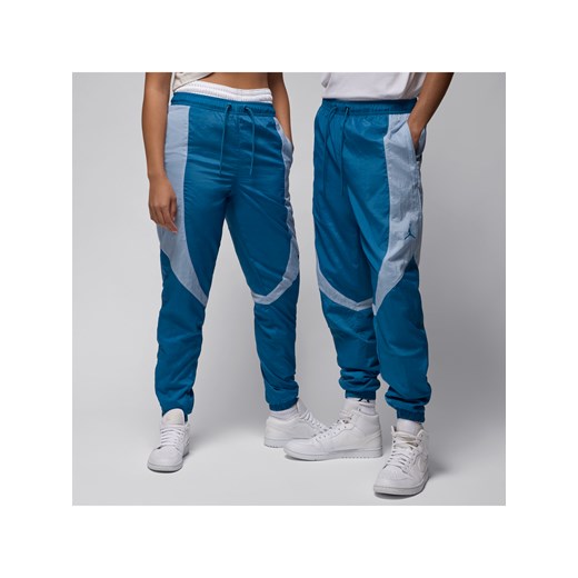 Męskie spodnie do rozgrzewki Jordan Sport Jam - Niebieski ze sklepu Nike poland w kategorii Spodnie męskie - zdjęcie 171364880