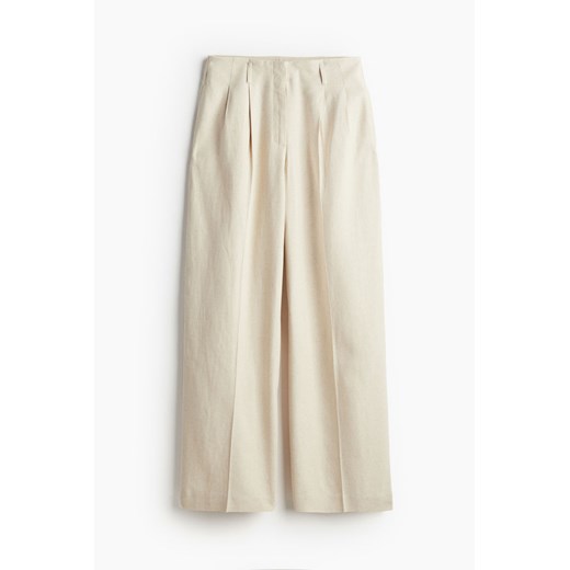 Beżowe spodnie damskie H & M wiosenne z tkaniny 
