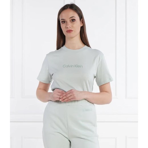 Calvin Klein T-shirt HERO LOGO | Regular Fit ze sklepu Gomez Fashion Store w kategorii Bluzki damskie - zdjęcie 171366721