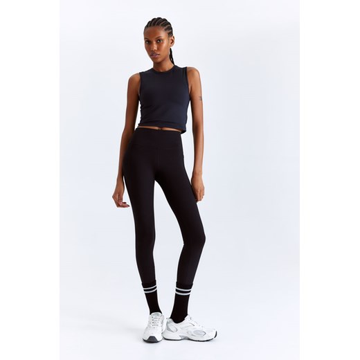 H & M - Sportowe legginsy DryMove z kieszonką - Czarny ze sklepu H&M w kategorii Spodnie damskie - zdjęcie 171438390