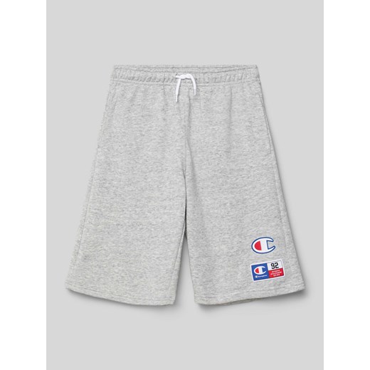 Szorty z dzianiny dresowej z nadrukiem z logo ze sklepu Peek&Cloppenburg  w kategorii Spodenki chłopięce - zdjęcie 171478411