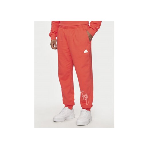 adidas Spodnie dresowe Graphic Print IS2009 Czerwony Regular Fit ze sklepu MODIVO w kategorii Spodnie męskie - zdjęcie 171499262