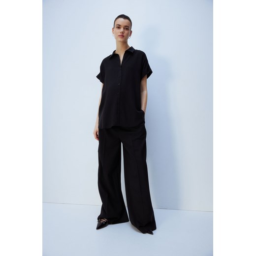 H & M - MAMA Bluzka z wiązanym paskiem - Czarny ze sklepu H&M w kategorii Bluzki ciążowe - zdjęcie 171537261