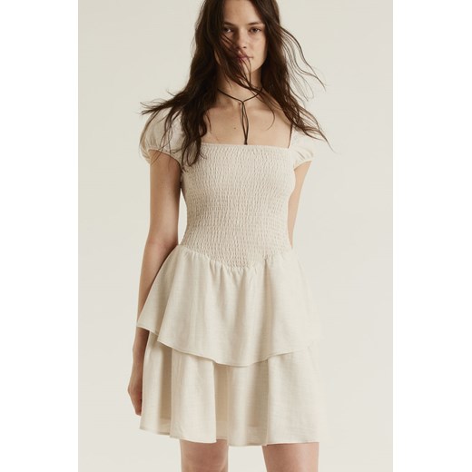H & M - Falbaniasta sukienka z elastycznym marszczeniem - Beżowy H & M M H&M
