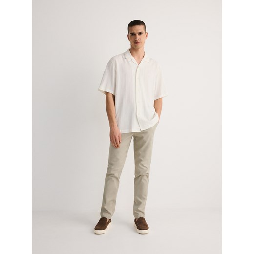 Reserved - Spodnie chino slim fit - jasnozielony ze sklepu Reserved w kategorii Spodnie męskie - zdjęcie 171556464