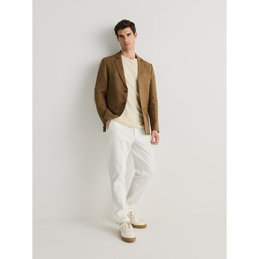 Reserved - Spodnie chino slim - złamana biel ze sklepu Reserved w kategorii Spodnie męskie - zdjęcie 171580004