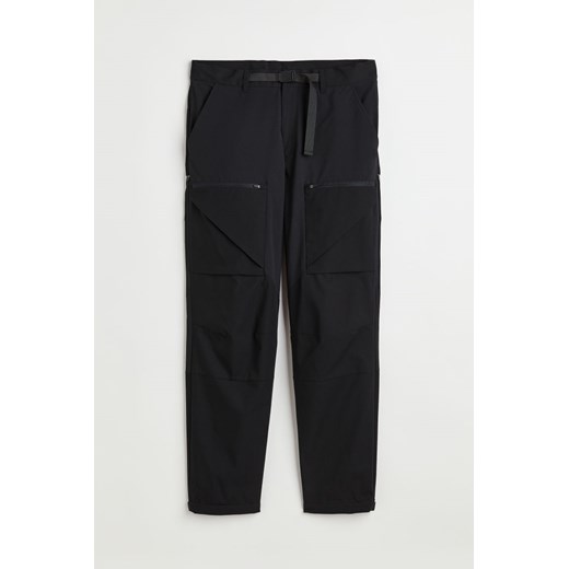 H & M - Przeciwdeszczowe spodnie outdoorowe Regular Fit - Czarny H & M M H&M