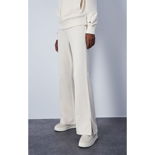Champion Spodnie dresowe w kolorze białym ze sklepu Limango Polska w kategorii Spodnie damskie - zdjęcie 171947011