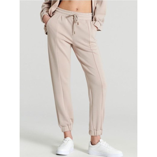 Sinsay - Spodnie dresowe - kremowy ze sklepu Sinsay w kategorii Spodnie damskie - zdjęcie 171950084