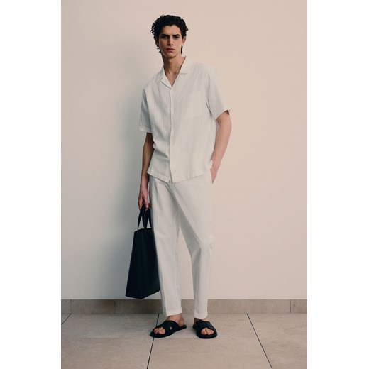H & M - Eleganckie joggersy Regular Fit - Biały ze sklepu H&M w kategorii Spodnie męskie - zdjęcie 171983182