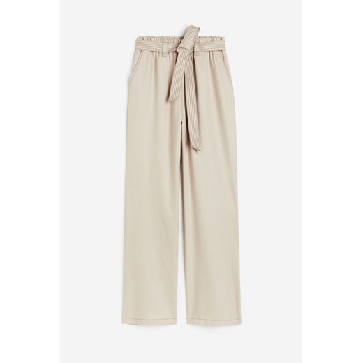 H & M - Spodnie z lyocellu z wiązanym paskiem - Beżowy H & M 46 H&M
