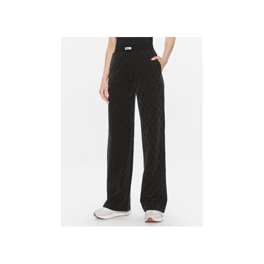 Guess Spodnie dresowe Logo V4RB13 KC2W0 Czarny Relaxed Fit ze sklepu MODIVO w kategorii Spodnie damskie - zdjęcie 172020061