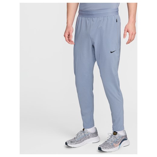 Męskie spodnie do fitnessu Dri-FIT Nike Flex Rep - Niebieski ze sklepu Nike poland w kategorii Spodnie męskie - zdjęcie 172023783