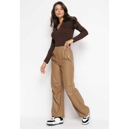 Beżowe Szerokie Spodnie z Imitacji Skóry z Gumką w Pasie Lundria ze sklepu Born2be Odzież w kategorii Spodnie damskie - zdjęcie 172032540