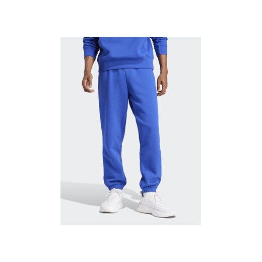 adidas Spodnie dresowe ALL SZN IW1186 Niebieski Regular Fit ze sklepu MODIVO w kategorii Spodnie męskie - zdjęcie 172104513