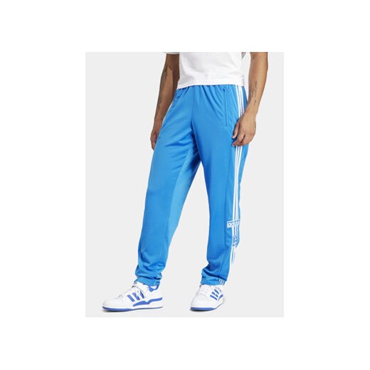 adidas Spodnie dresowe adicolor Classics Adibreak IM8224 Niebieski Regular Fit ze sklepu MODIVO w kategorii Spodnie męskie - zdjęcie 172104871