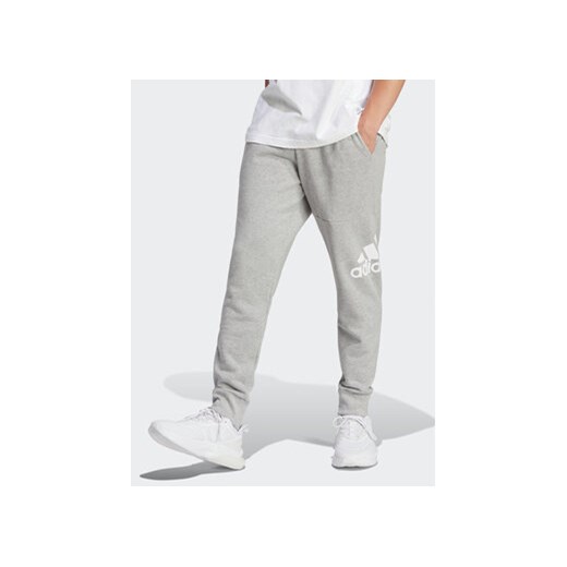 adidas Spodnie dresowe Essentials HA4345 Szary Regular Fit ze sklepu MODIVO w kategorii Spodnie męskie - zdjęcie 172104884