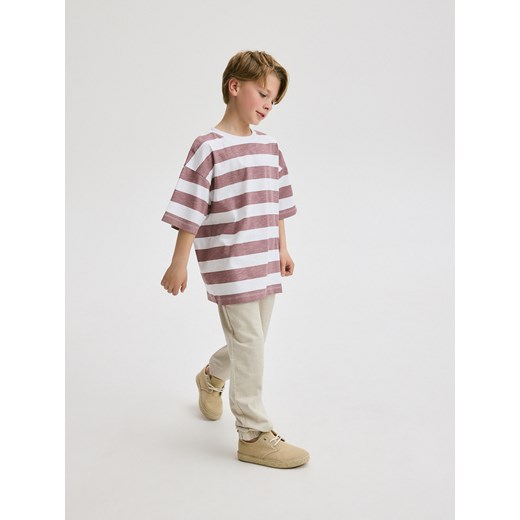 Reserved - Joggery z dresowej dzianiny - beżowy ze sklepu Reserved w kategorii Spodnie chłopięce - zdjęcie 172151290