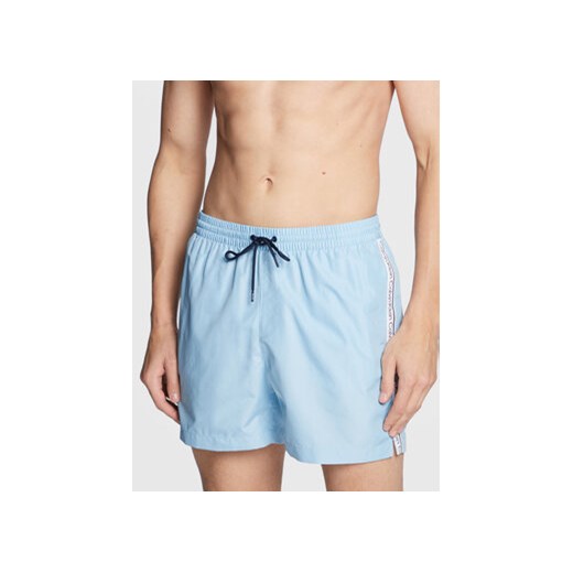 Calvin Klein Swimwear Szorty kąpielowe KM0KM00789 Błękitny Regular Fit ze sklepu MODIVO w kategorii Kąpielówki - zdjęcie 172166214