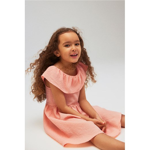 H & M - Wzorzysta sukienka z falbaną - Pomarańczowy ze sklepu H&M w kategorii Sukienki dziewczęce - zdjęcie 172183520