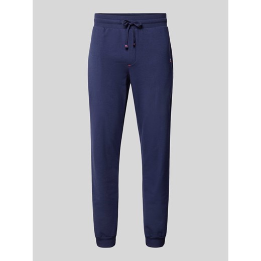 Spodnie dresowe w jednolitym kolorze ze sklepu Peek&Cloppenburg  w kategorii Spodnie męskie - zdjęcie 172238921