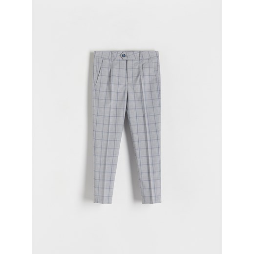 Reserved - Eleganckie spodnie slim - granatowy ze sklepu Reserved w kategorii Spodnie chłopięce - zdjęcie 172241811