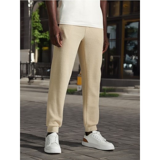 Sinsay - Spodnie dresowe - kremowy ze sklepu Sinsay w kategorii Spodnie męskie - zdjęcie 172282613