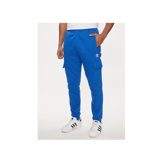 adidas Spodnie dresowe adicolor Trefoil IP2758 Niebieski Regular Fit ze sklepu MODIVO w kategorii Spodnie męskie - zdjęcie 172288423