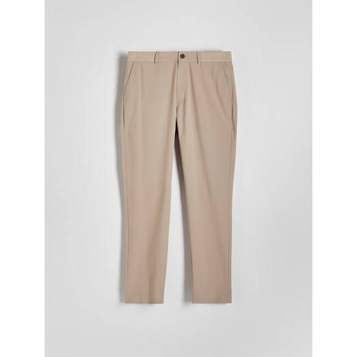 Reserved - Spodnie slim fit - beżowy Reserved 34 Reserved