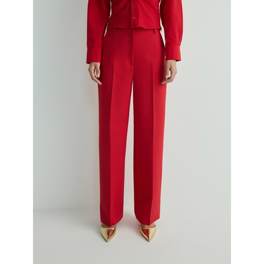 Reserved - Spodnie w kant z wiskozą - czerwony ze sklepu Reserved w kategorii Spodnie damskie - zdjęcie 172326253