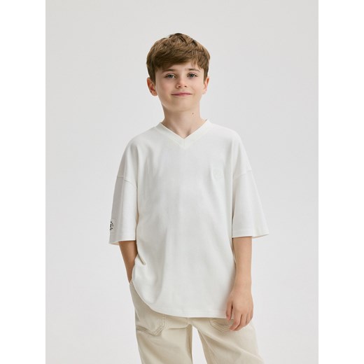 Reserved - T-shirt oversize z naszywką - kremowy ze sklepu Reserved w kategorii T-shirty chłopięce - zdjęcie 172353114