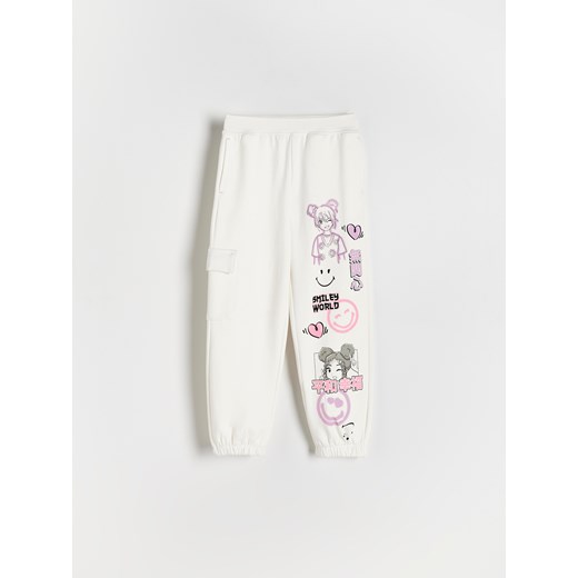 Reserved - Spodnie dresowe SmileyWorld® - złamana biel ze sklepu Reserved w kategorii Spodnie dziewczęce - zdjęcie 172353150