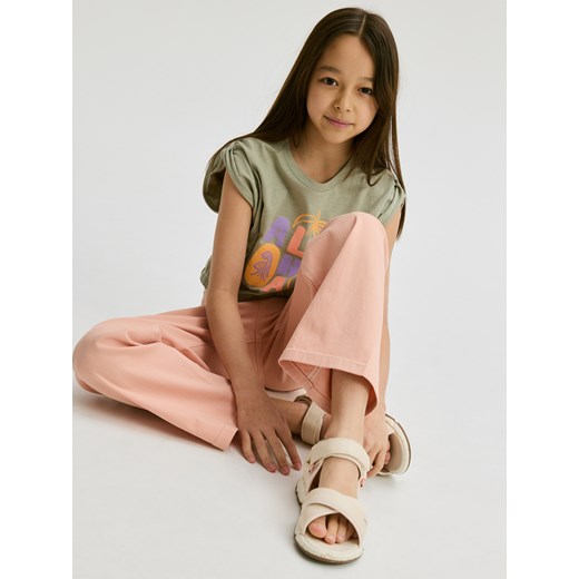 Spodnie dziewczęce Reserved z elastanu pomarańczowe wiosenne