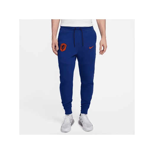 Męskie joggery piłkarskie Nike Holandia Tech Fleece - Niebieski ze sklepu Nike poland w kategorii Spodnie męskie - zdjęcie 172407190