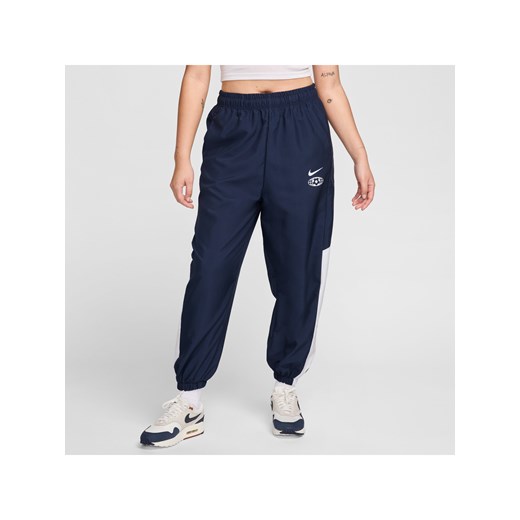 Damskie joggery z tkaniny Nike Sportswear - Niebieski ze sklepu Nike poland w kategorii Spodnie damskie - zdjęcie 172407281
