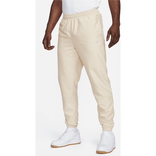 Męskie spodnie z tkaniny Nike Sportswear - Brązowy Nike XL Nike poland