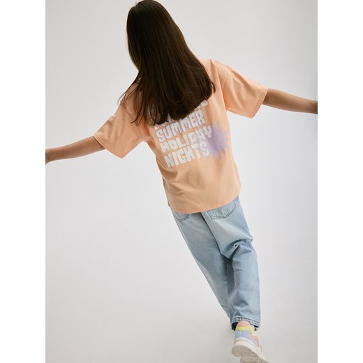Reserved - T-shirt z nadrukiem - brzoskwiniowy ze sklepu Reserved w kategorii Bluzki dziewczęce - zdjęcie 172432084