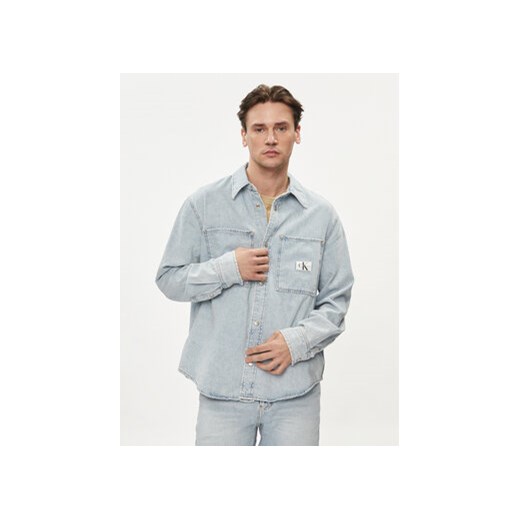 Calvin Klein Jeans Koszula jeansowa Linear J30J324894 Błękitny Regular Fit ze sklepu MODIVO w kategorii Koszule męskie - zdjęcie 172447572