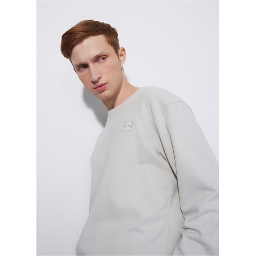 Kremowa bluza męska z logo Ochnik One Size promocja OCHNIK