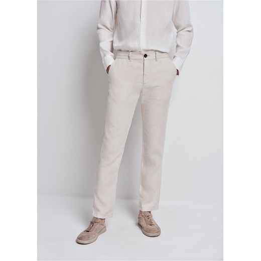 Beżowe lniane spodnie męskie ze sklepu OCHNIK w kategorii Spodnie męskie - zdjęcie 172563324