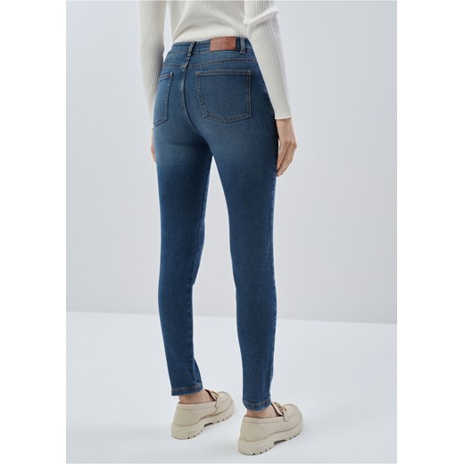 Granatowe spodnie jeansowe damskie Ochnik One Size wyprzedaż OCHNIK