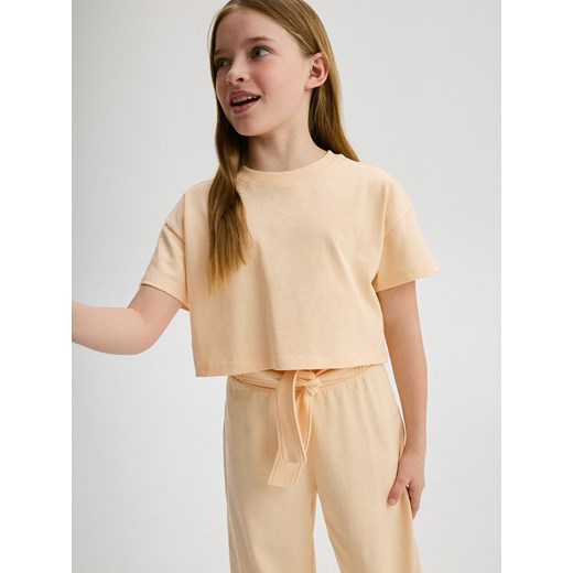 Reserved - Bawełniany t-shirt - jasnopomarańczowy ze sklepu Reserved w kategorii Bluzki dziewczęce - zdjęcie 172576800