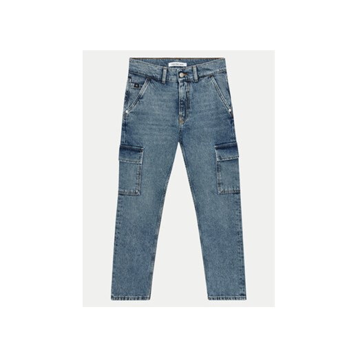 Calvin Klein Jeans Jeansy Iconic IB0IB01996 Niebieski Regular Fit ze sklepu MODIVO w kategorii Spodnie chłopięce - zdjęcie 172598143