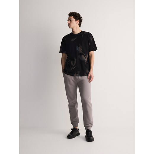 Reserved - Bawełniane spodnie dresowe - beżowy ze sklepu Reserved w kategorii Spodnie męskie - zdjęcie 172599853