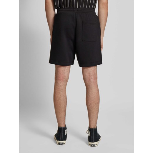 Szorty z dzianiny dresowej o kroju regular fit z naszywką z logo model ‘BEACH’ Tommy Jeans M Peek&Cloppenburg 