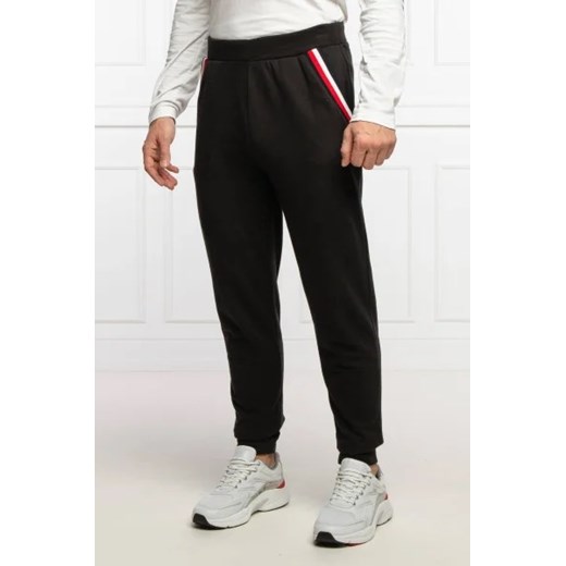 Tommy Hilfiger Spodnie dresowe | Regular Fit ze sklepu Gomez Fashion Store w kategorii Spodnie męskie - zdjęcie 172938511