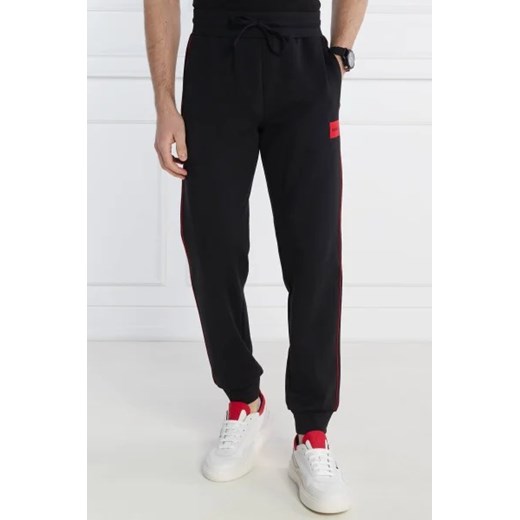 Hugo Bodywear Spodnie dresowe Badge Pants | Relaxed fit ze sklepu Gomez Fashion Store w kategorii Spodnie męskie - zdjęcie 172943074