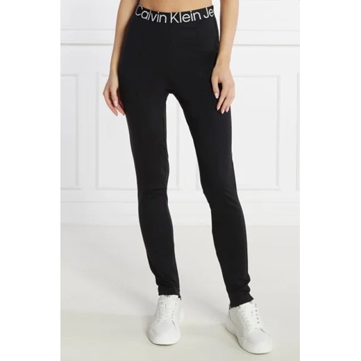 CALVIN KLEIN JEANS Legginsy LOGO TAPE MILANO | Slim Fit ze sklepu Gomez Fashion Store w kategorii Spodnie damskie - zdjęcie 172948872